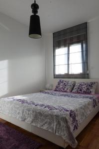 Ένα ή περισσότερα κρεβάτια σε δωμάτιο στο Apartment Taurus