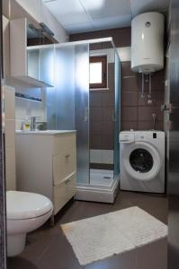 Ένα μπάνιο στο Apartment Taurus