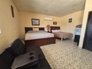 Postel nebo postele na pokoji v ubytování Hotel Destination Cuatro Cienegas + 17 fotografií