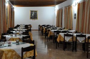 Reštaurácia alebo iné gastronomické zariadenie v ubytovaní B&B La Seta Rossa