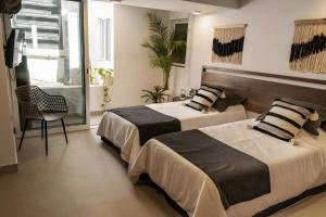 Ένα ή περισσότερα κρεβάτια σε δωμάτιο στο Apartment near the beach with terrace #10 +39 φωτογραφίες