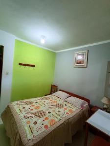 Postel nebo postele na pokoji v ubytování HOSTAL GRAU