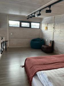 a bedroom with a large bed in a room at Country House in Almaty +29 photos