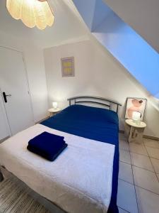 Postel nebo postele na pokoji v ubytování Les gîtes du Mesnil chambre standard