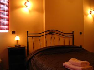 Postel nebo postele na pokoji v ubytování Alonaki Guesthouse