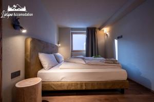 Posteľ alebo postele v izbe v ubytovaní Chalet 1816 by Livigno Accomodation