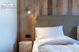 Posteľ alebo postele v izbe v ubytovaní Chalet 1816 by Livigno Accomodation