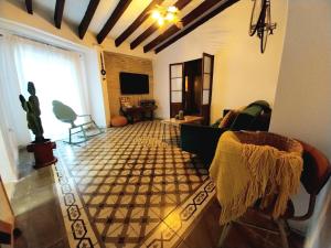 Et tv og/eller underholdning på Apartamento Boutique Kala Ático