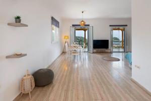 Telewizja i/lub zestaw kina domowego w obiekcie Dream view apartments