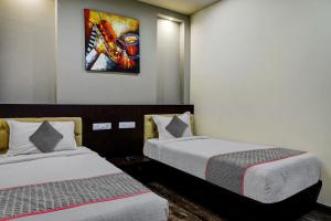 Postel nebo postele na pokoji v ubytování Townhouse Dev's Inn by CJ