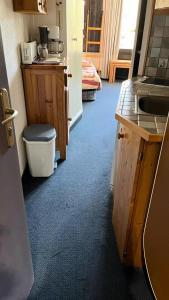 a kitchen with a sink and a toilet in a room at Résidence Les Ruches - maeva Home - Studio 4 personnes - Sélection MAE-5761 in Avoriaz