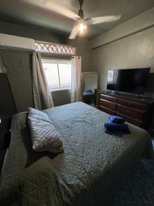 Ένα ή περισσότερα κρεβάτια σε δωμάτιο στο Penthouse 3 at Malecon PV Heart