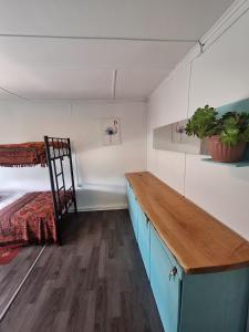 Postel nebo postele na pokoji v ubytování Hostel Kuntur