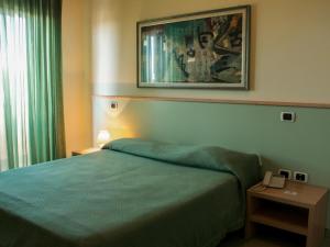 Posteľ alebo postele v izbe v ubytovaní Blu Hotel + 37 fotografií
