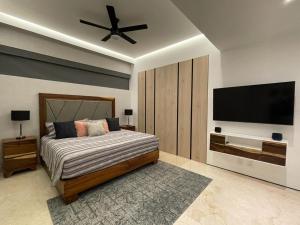 Postel nebo postele na pokoji v ubytování Luxurious Condo Colozza SohoPV 1Bed 2Bath + 13 fotografií