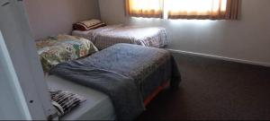 パパモアにあるPapamoa Budget Accommodationのギャラリーの写真