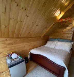Postel nebo postele na pokoji v ubytování Cabaña La Aurora