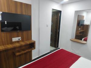TV a/nebo společenská místnost v ubytování Hotel Maruti R