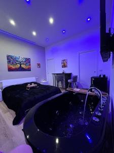 a bedroom with a bed and a bath tub at Sweet dreams in Palermo