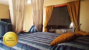Postel nebo postele na pokoji v ubytování Duna Relax Hotel Ráckeve