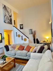 a living room with a couch and a table at Exclusive City Apartment - Very Spacious in Sheffield