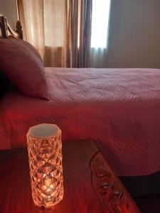 Ένα ή περισσότερα κρεβάτια σε δωμάτιο στο Elgin Guest