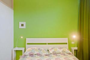 Letto o letti in una camera di Casaalmare