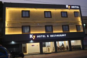 akl hotel and restaurant is lit up at night at K7 Hotel & Restaurant in Rānchī