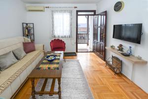 TV a/nebo společenská místnost v ubytování Tim Apartment