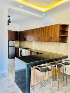 Η κουζίνα ή μικρή κουζίνα στο Dash apt b