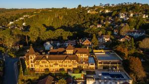 an aerial view of a large house at Hotel Le Renard - Campos do Jordao in Campos do Jordão
