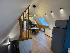 Køkken eller tekøkken på Appartement Moderne et Cosy à Grand Bourgtheroulde Proche de la Côte Normande + 9 billeder