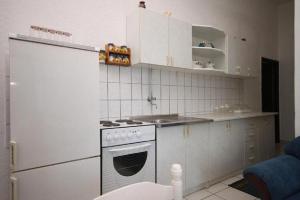Kuchyňa alebo kuchynka v ubytovaní Apartments Stipe