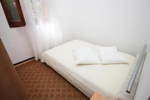 Posteľ alebo postele v izbe v ubytovaní Apartments Stipe