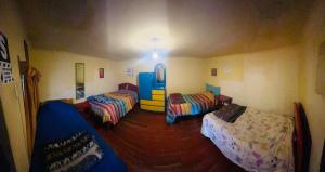 Voodi või voodid majutusasutuse Hostel Rivendell Cusco toas