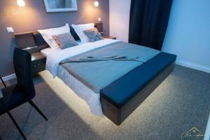 Voodi või voodid majutusasutuse Premium Cayenne Appartement- Private Cine & SPA -CTIS HOME toas