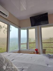 Cabaña SkyView房間的床