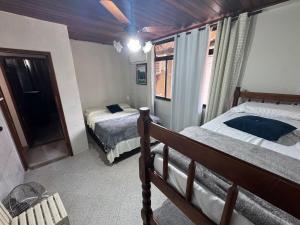 Giường trong phòng chung tại Casa Du Mauro