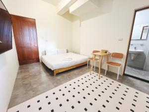 Postel nebo postele na pokoji v ubytování 日子有光 SHINE Inn Day