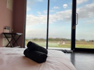 Postel nebo postele na pokoji v ubytování Lugo Hotel