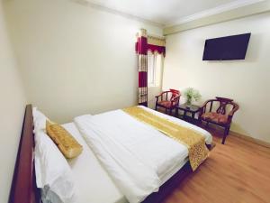 TV a/nebo společenská místnost v ubytování Indochina Airport Hotel Ha Noi