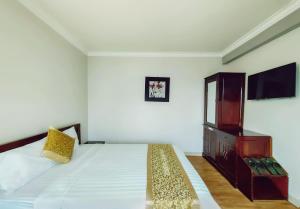 Postel nebo postele na pokoji v ubytování Indochina Airport Hotel Ha Noi