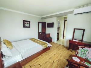 Postel nebo postele na pokoji v ubytování Indochina Airport Hotel Ha Noi