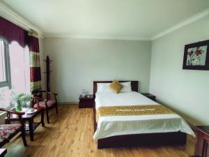 Postel nebo postele na pokoji v ubytování Indochina Airport Hotel Ha Noi