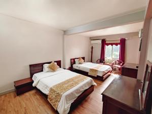 Postel nebo postele na pokoji v ubytování Indochina Airport Hotel Ha Noi