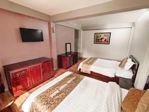 Postel nebo postele na pokoji v ubytování Indochina Airport Hotel Ha Noi