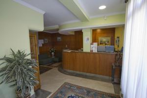 a lobby of a hospital with a reception desk at Hotel Cabo Festiñanza in Sanxenxo +179 photos