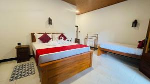 Postel nebo postele na pokoji v ubytování Sigiri Delight Holiday home + 27 fotografií