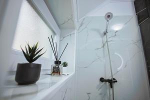 Ένα μπάνιο στο Apartament Domina - RO,EN,FR-Certificat clasificare 3 stele, Ministerul Turismului