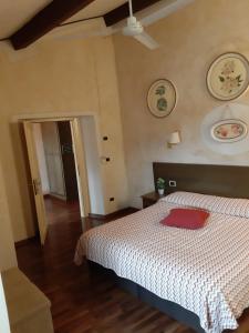 Postel nebo postele na pokoji v ubytování Hotel Borgo Antico